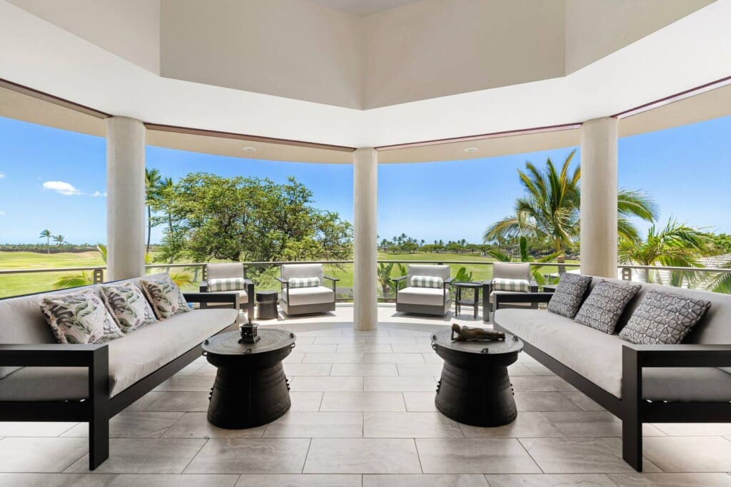 vJ0wpit7SeRq3WZCovered outdoor lanai with lounge seating overlooking the Mauna Lani golf course at Hale Mele luxury vacation rental on the Big Island of Hawaii.wbjsi36dI3GGtHBJviC4dkqzJ.jpg