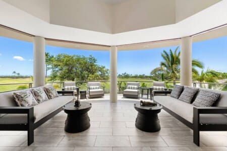 vJ0wpit7SeRq3WZCovered outdoor lanai with lounge seating overlooking the Mauna Lani golf course at Hale Mele luxury vacation rental on the Big Island of Hawaii.wbjsi36dI3GGtHBJviC4dkqzJ.jpg