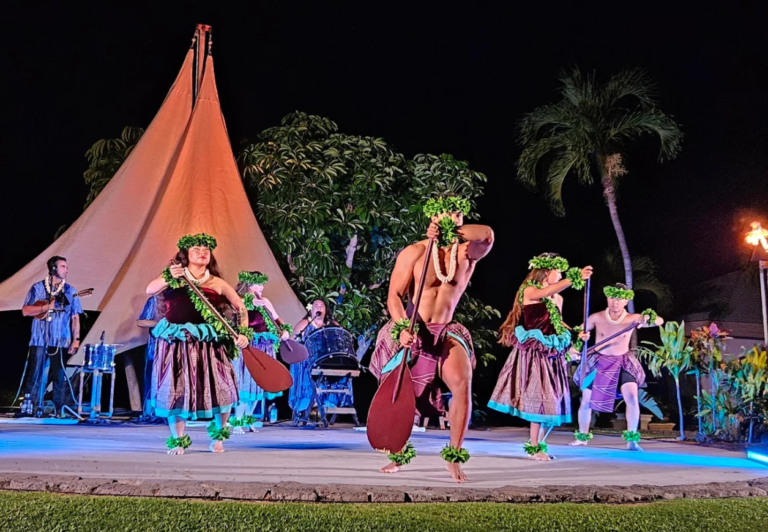 Hula dancers and musicians performing at the Hawaiʻi Loa Lūʻau at Fairmont Orchid on the Big Island of Hawaii